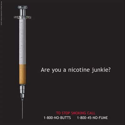 Syringe avec liquide, symbole de surdose de nicotine